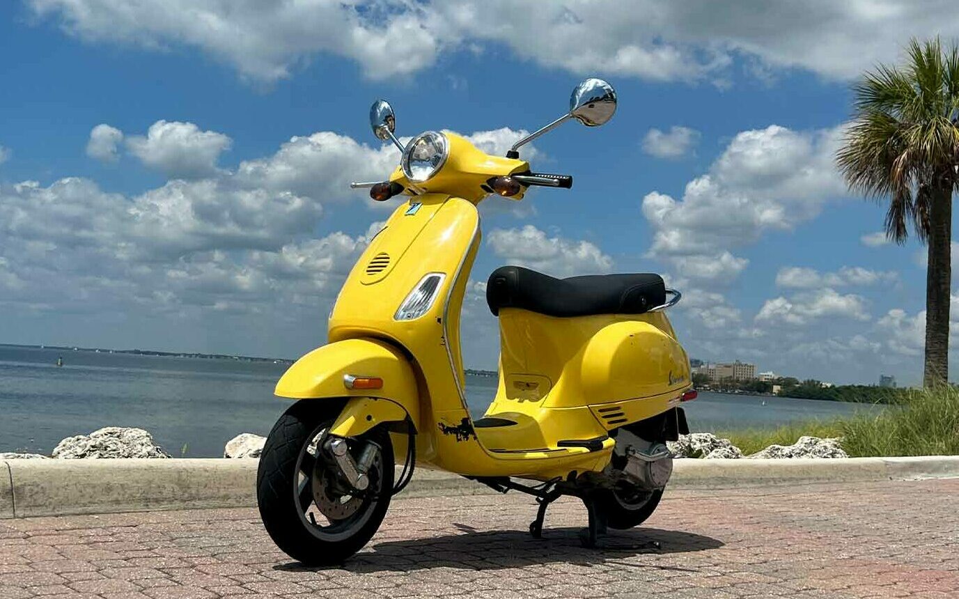 vespa-scooter-rental-lx50-yellow-front-left