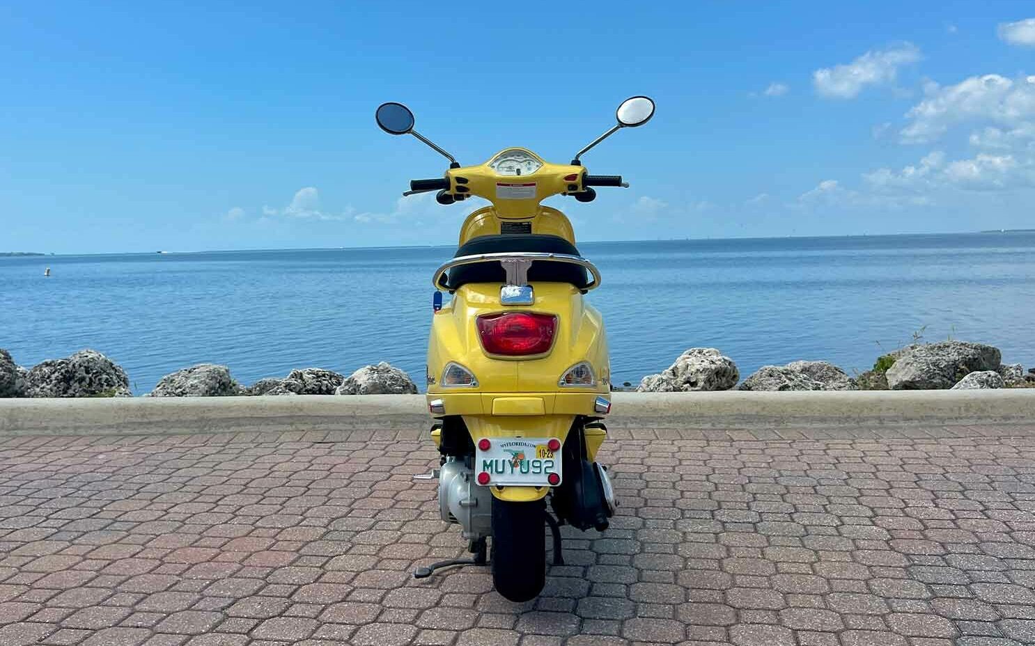 vespa-scooter-rental-lx50-yellow-rear