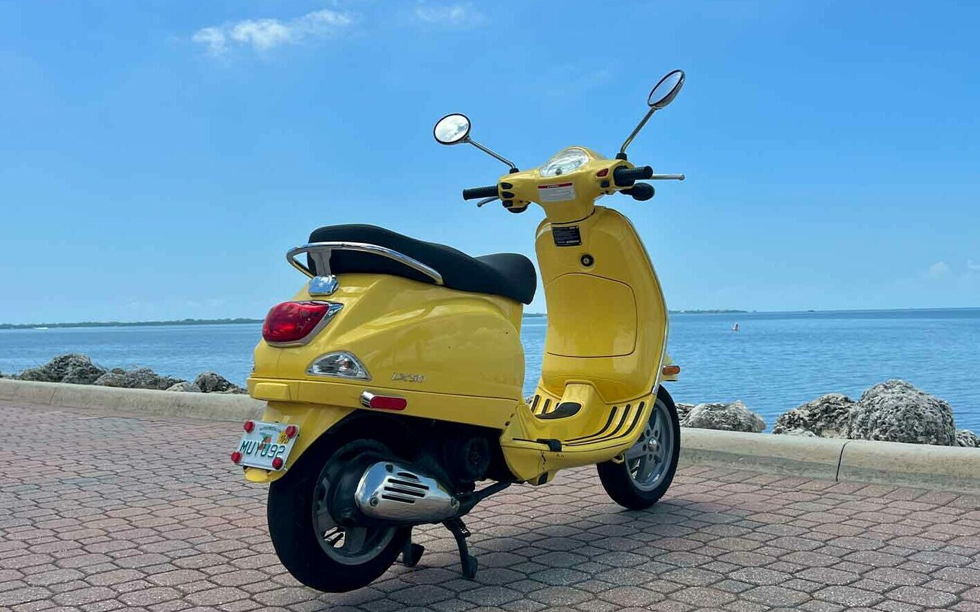 vespa-scooter-rental-lx50-yellow-rear-right