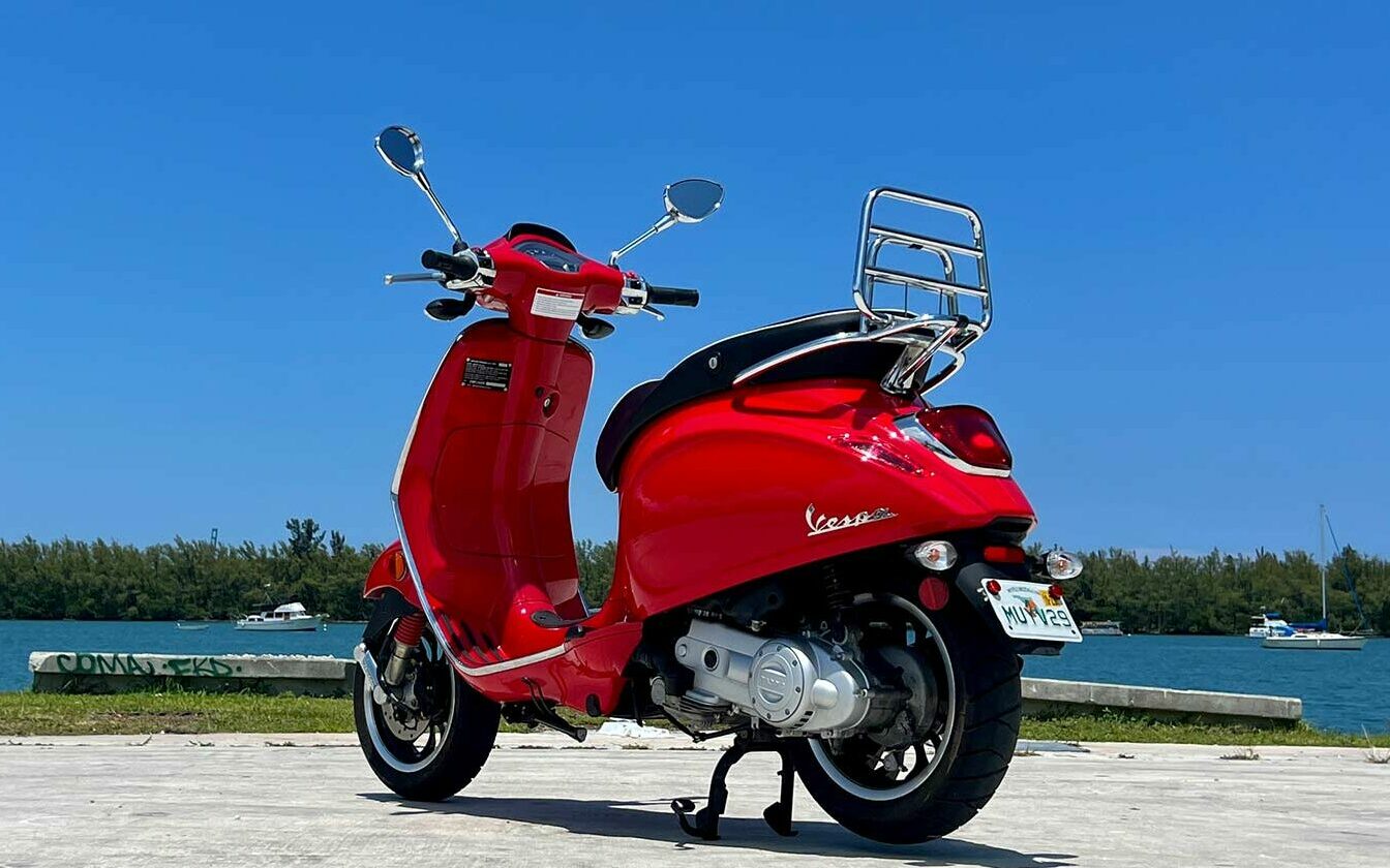vespa-scooter-rental-sprint50-red-scooter-back-left