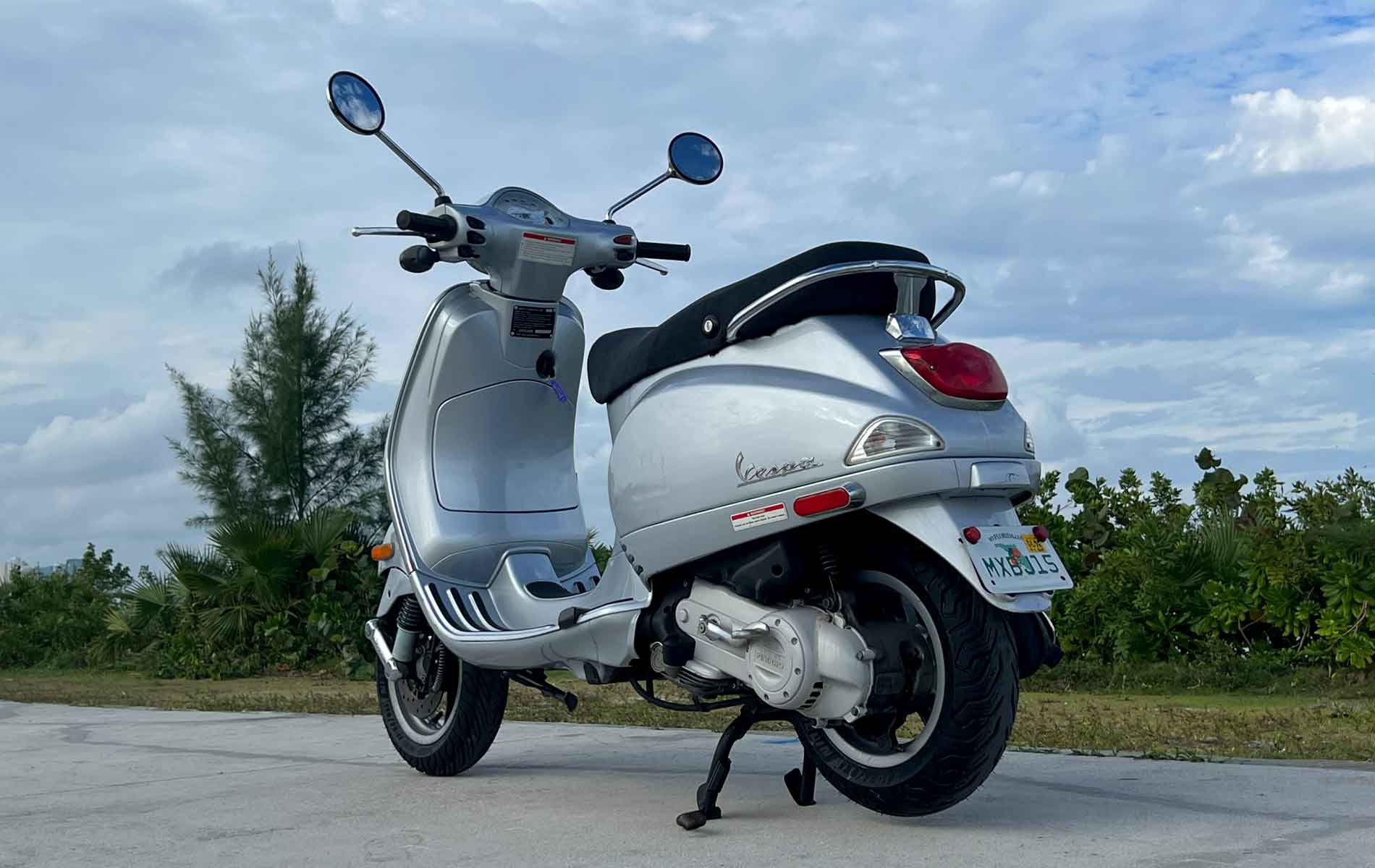 rent-a-vespa-lx-50cc-motorcycle-silver-back-left-side